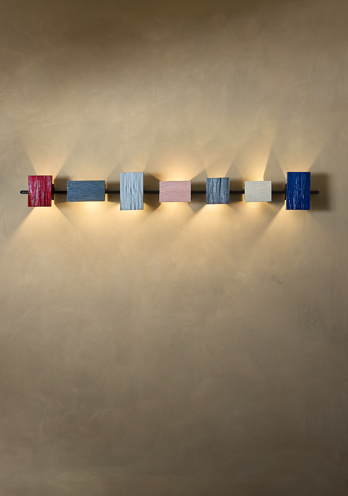 Wall LightSteel tubing and split wood, hand-painted by Jejo Cornelsen. Brazil, 2026.59" x 5” x 7"Inquire